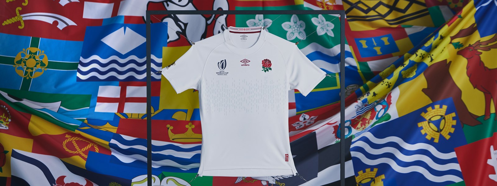 umbro-england-rugby-23-24-home-jersey-held-up