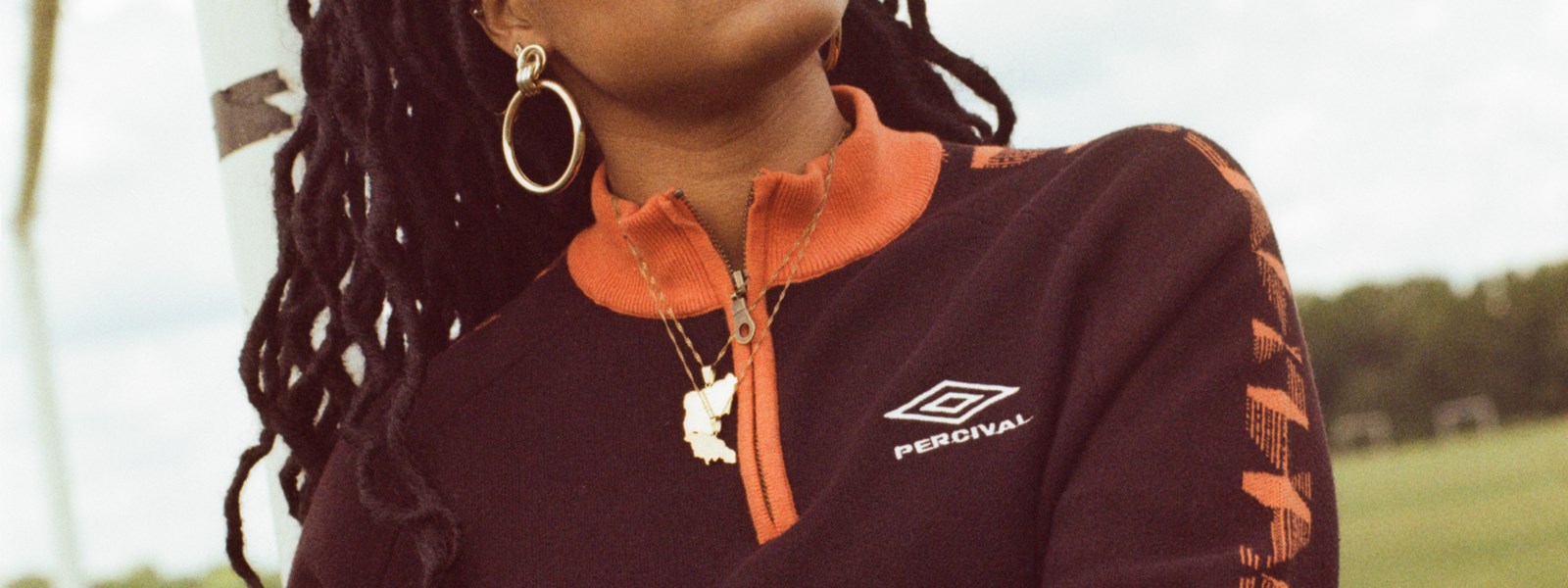 percival-x-umbro-female-model-wearing-zip-up-top