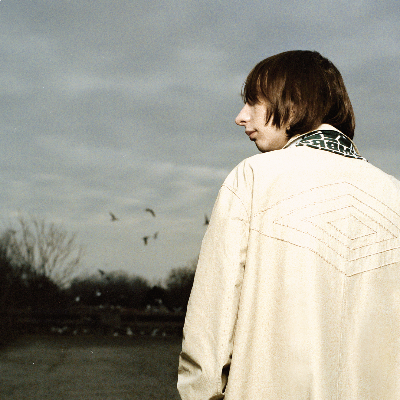 umbro-slam-jam-model-in-car-coat