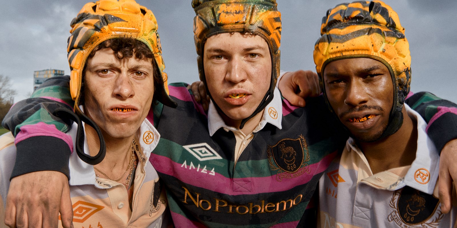 aries-x-umbro-rugby-players-huddled-together
