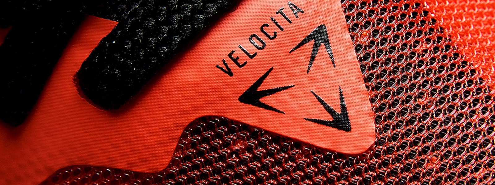 velocita-pro-cherry-tomato-black-silo-logo-shot