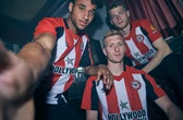 umbro-brentford-fc-23-25-home-kit-three-players