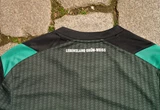 werder-bremen-21-22-third-kit-neck-signoff-shot