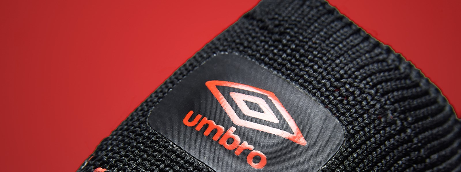 velocita-pro-cherry-tomato-black-umbro-logo-shot