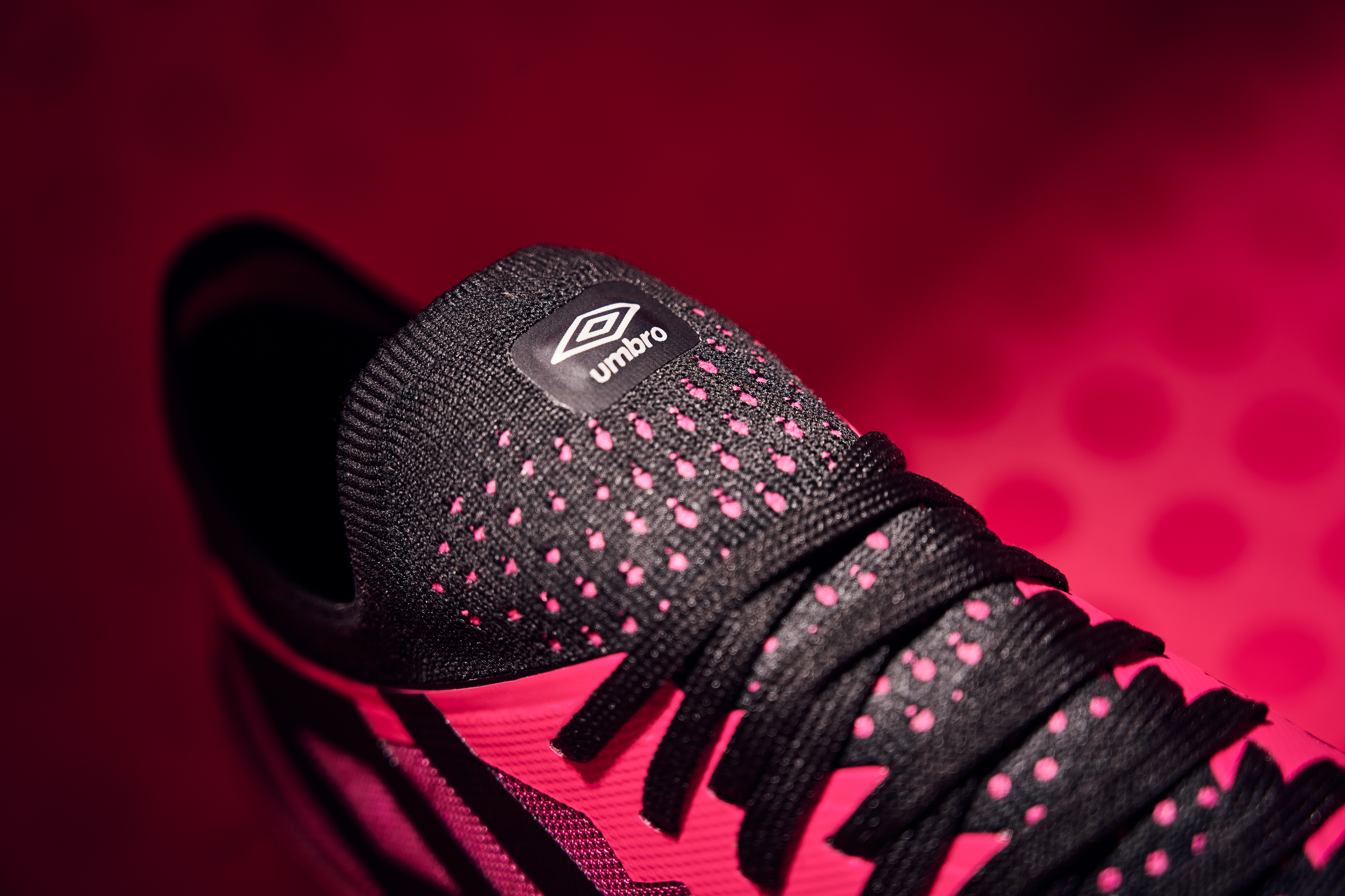 velocita-6-pink-peacock-black-umbro-logo-shot