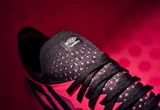 velocita-6-pink-peacock-black-umbro-logo-shot