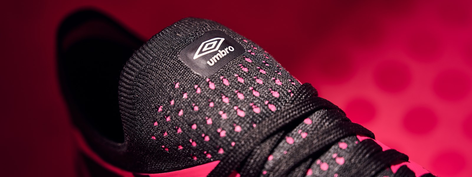 velocita-6-pink-peacock-black-umbro-logo-shot