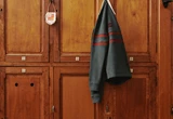balibaris-x-umbro-polo-shirt-hanging-in-locker-room