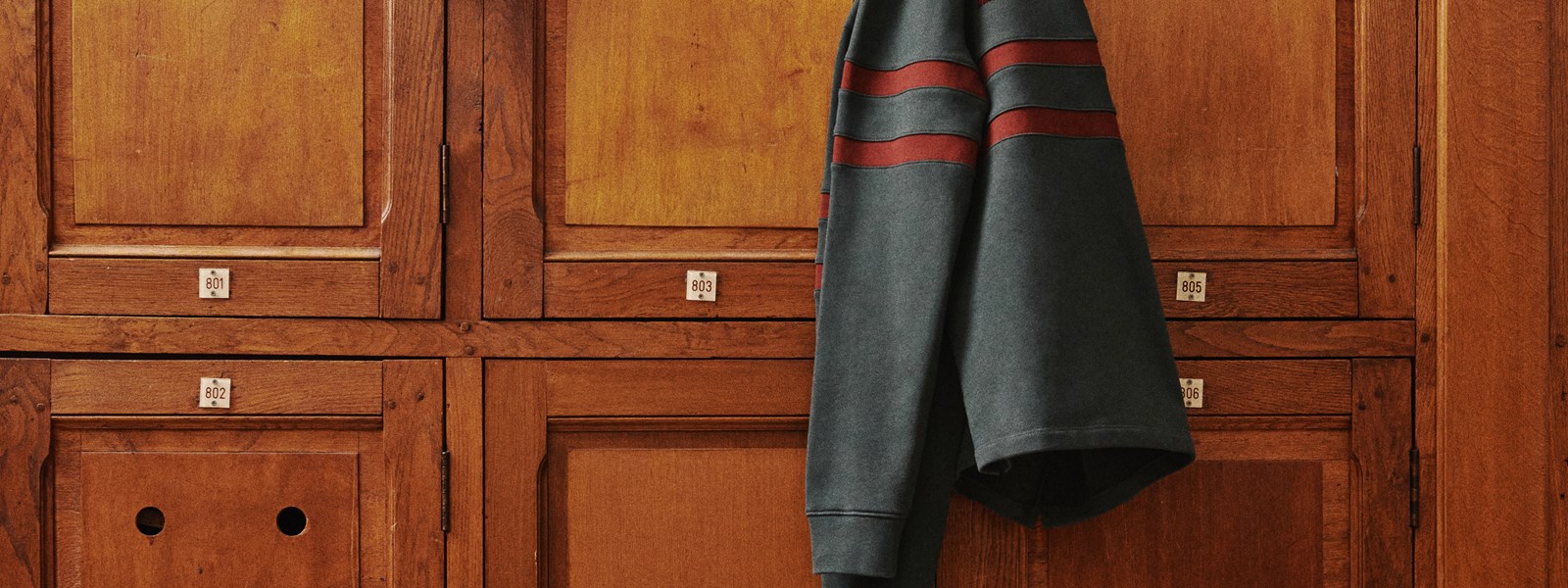 balibaris-x-umbro-polo-shirt-hanging-in-locker-room